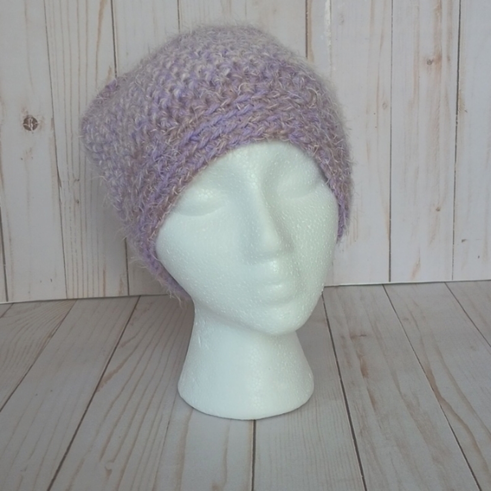 Hand crocheted beanie with faux fur pom